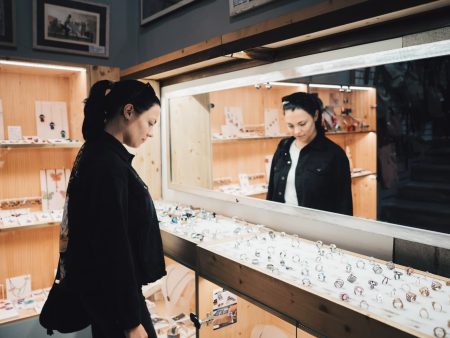 Young girl in retail jewelry store